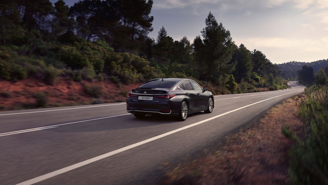 Lexus ES driving in a rural area