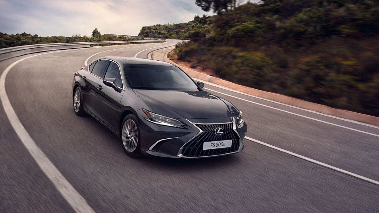 Lexus ES driving on a hillside road